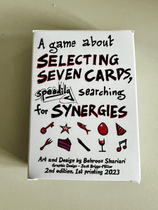 A game about selecting seven cards, speedily searching for synergies.