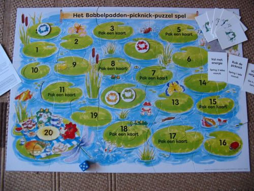 Het Babbelpadden-picknick-puzzel spel