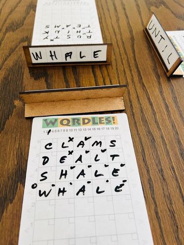 WQRDLES: A Tactile Wordle-Like Multi-Player Word Deduction Game